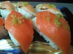 Nigiri with salmon and wasabi.