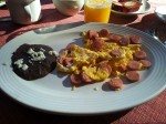 Desayuno Mexicano in Oaxaca - scrambled eggs with sausages (huevos revueltos con salchicha) and fried beans. 