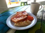 Toasted bread with jam and fruits - banana and papaya - Playa del Carmen, Guacamole guesthouse.