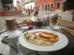 Huevos de Valla with frijoles - Omelet like eggs served with local cheese and fried beans; breakfast in San Miguel de Allende.