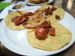 Tacos con carne adobada - tacos with marinated meat.