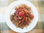 Roasted pork with bacon fried onion and potatoes.