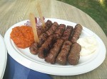 Ćevapčići meal with kaymak cheese and ajvar