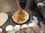 Savory pancakes with mozzarella, Parma ham, rucola and cherry tomatoes