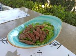 Keto Beef steak salad with nuts and tomatoes