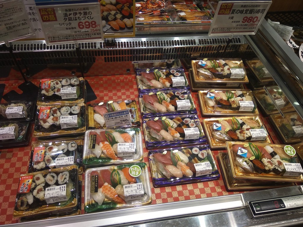Selection of sushi sets in a Japanese supermarket.