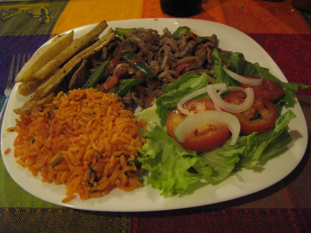 Bistec a la Mexicana with french fries, Mexican style rice and salad.