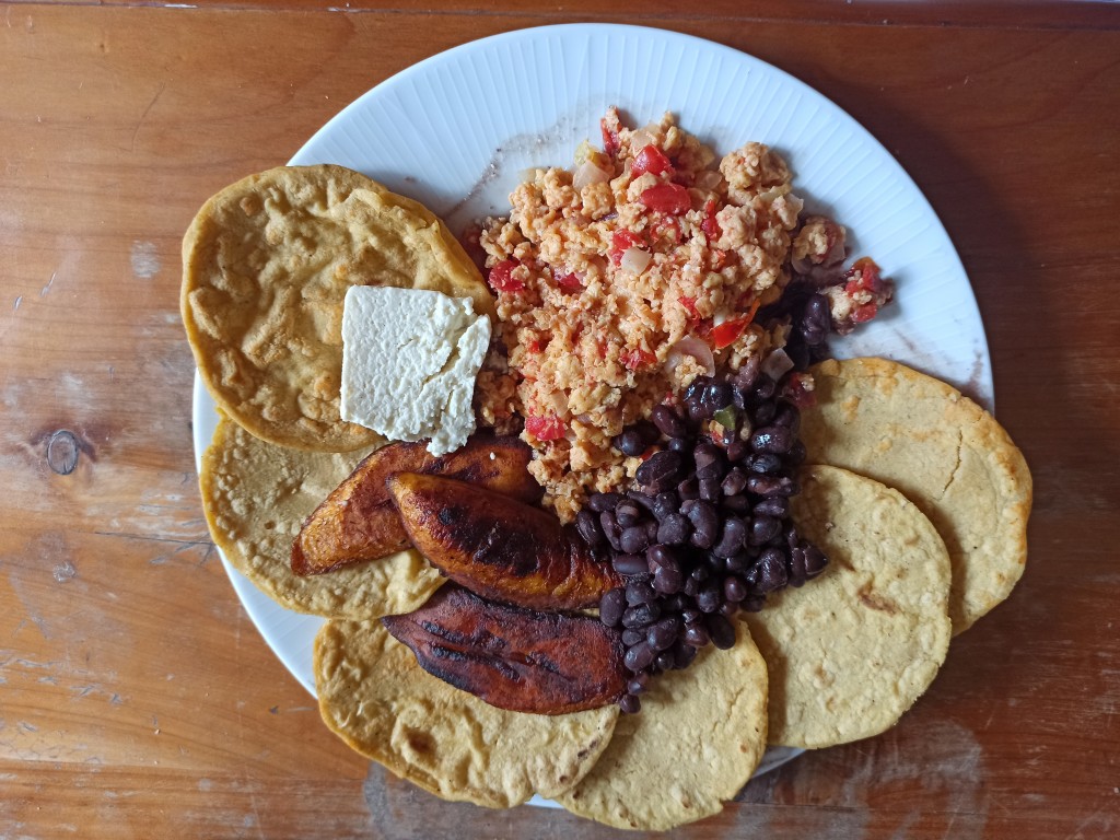 Desayuno Chapin with eggs, red beans, platans, cream or fresh cheese and tortillas Desayuno Chapin with eggs, red beans, platans, cream or fresh cheese and tortillas