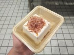Hard tofu with bonito flakes - fermented, dried and smoked fish flakes.