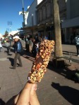 Vanilla ice creams in chocolate with oats and nuts.