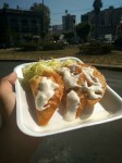 A selection of Mexican empanadas - con queso, carne y champinos - Mexican fried dumplings with fresh cheese, meat and mushroom. All served with white cabbage and topped with cream.