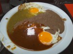 Huevos divorciados con salsa verde y roja y frijoles - Rancher's eggs with red and green salsa and fried beans. Huevos divorciados con salsa verde y roja y frijoles - Rancher's eggs with red and green salsa and fried beans.