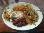 Casado - pork topped with fried onion- Costa Rica
