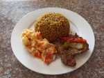 Pork with arroz moro - La Bandera - plato del día, Dominican Republic