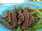 Keto Beef steak salad with nuts and tomatoes