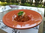 Red rice risotto with prawns and parmesan cheese