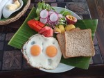 Poached eggs with toasts, vegetables and fruits Poached eggs with toasts, vegetables and fruits