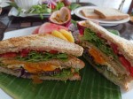 Toasts with eggs and vegetables served with fresh fruits