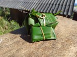 Banana leaf lunch box for a meal during the jungle trekking in Thailand