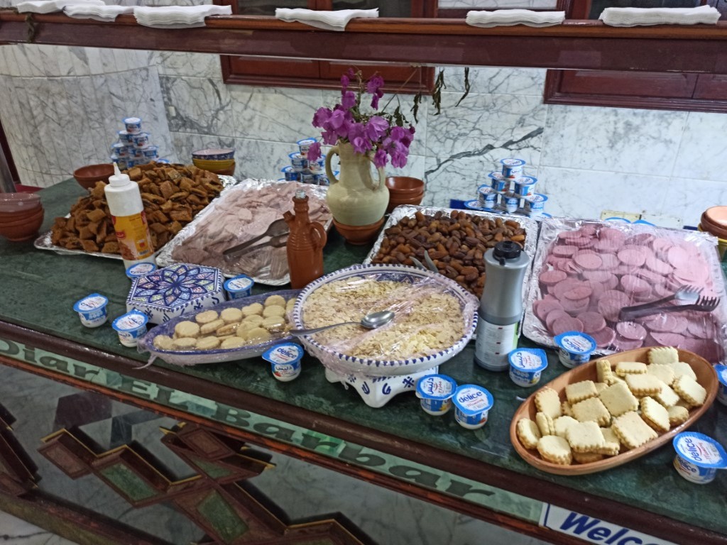 Muesli with syrups, crackers and yoghurt