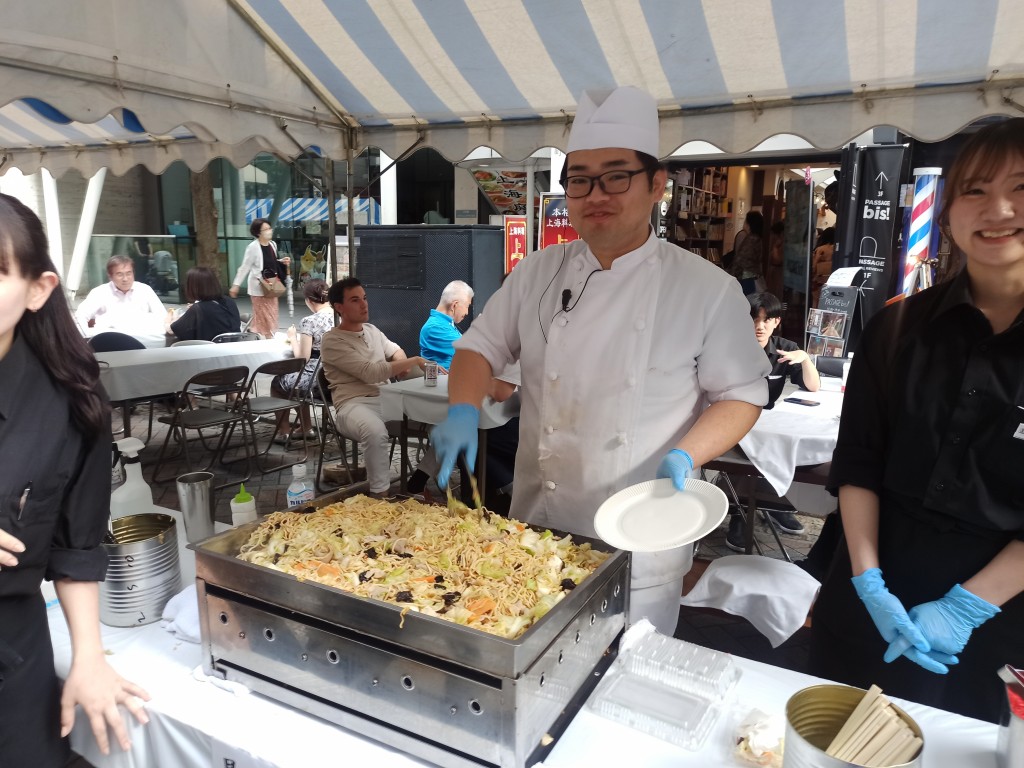 Trying Japanese yakisoba during the Sanja Matsuri Festival