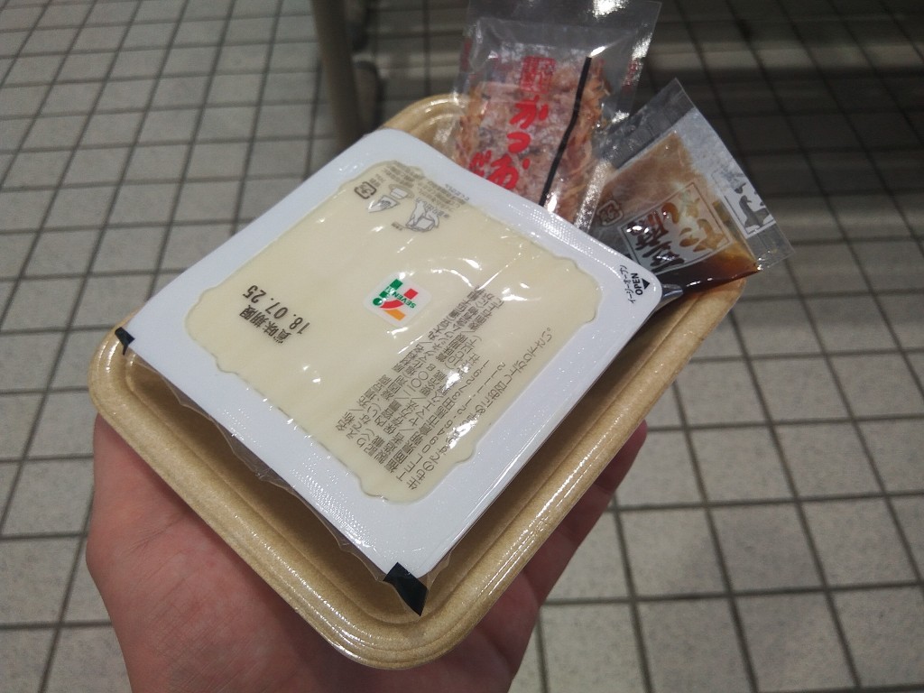 Hard tofu with soy sauce and bonito flakes from 7-eleven store.