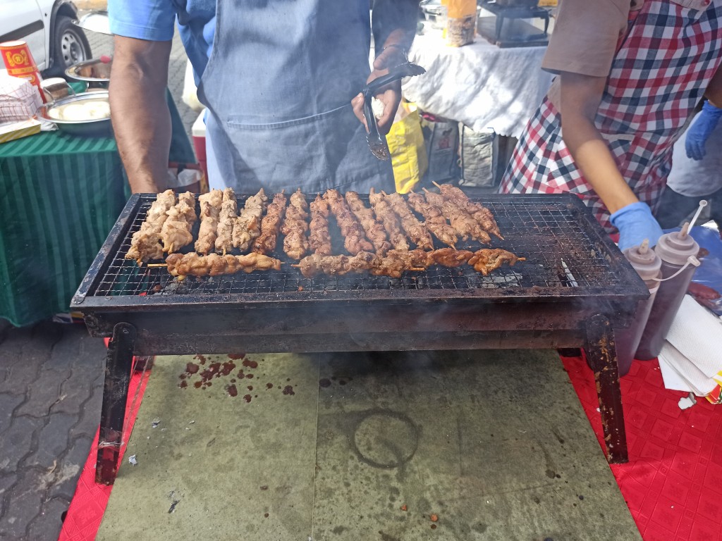 Japanese yakitori - meat skewers - Sunday Asian Street food market in Santo Domingo