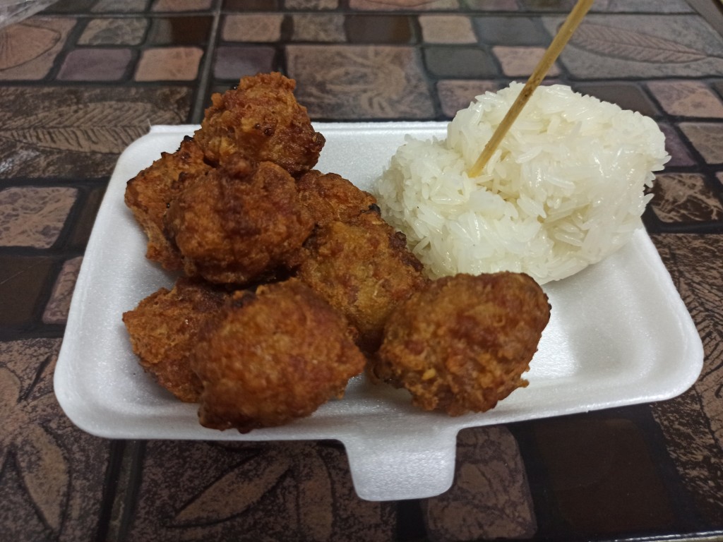 Deep fried pork balls with sticky rice