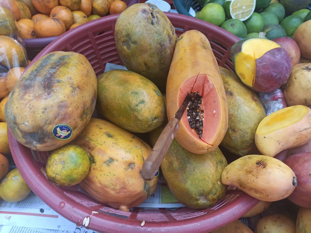 TOP 10 Guatemalan fruits for visiting Tikal and Uaxactun Mayan ruins - Papaya