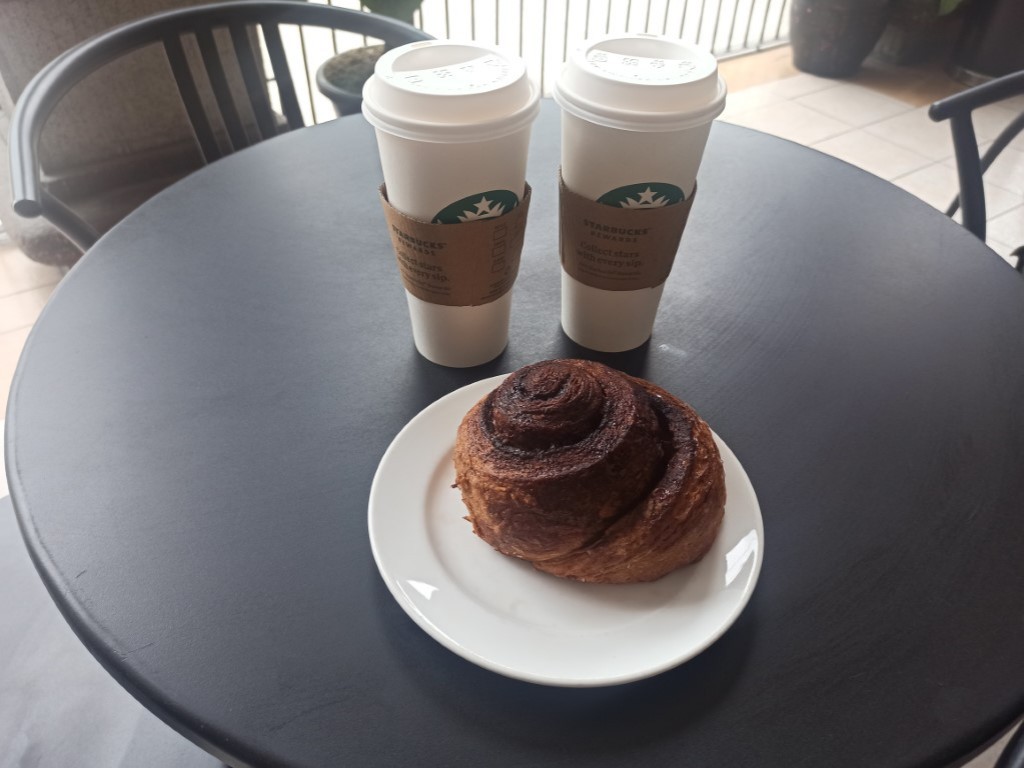Starbucks in the heart of the historic center of Manila, Intramuros in the Philippines - two venti coffees and a warm Dannish roll